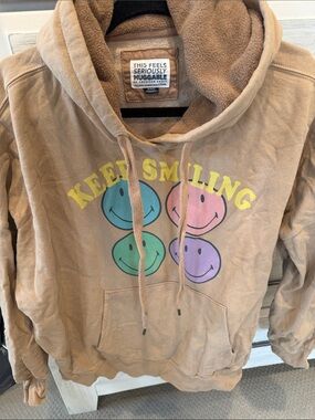 American Eagle Outfitters Tan Sherpa-Lined Hoodie with Pastel Smiley Graphic